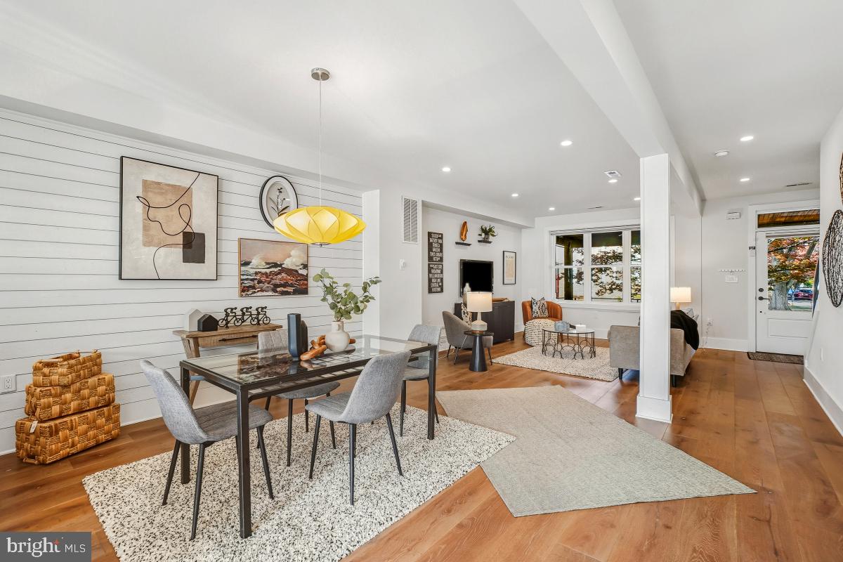 714 Decatur Street Northwest Washington, DC 20011 - Photo 11 of 40 a living room with furniture and wooden floor