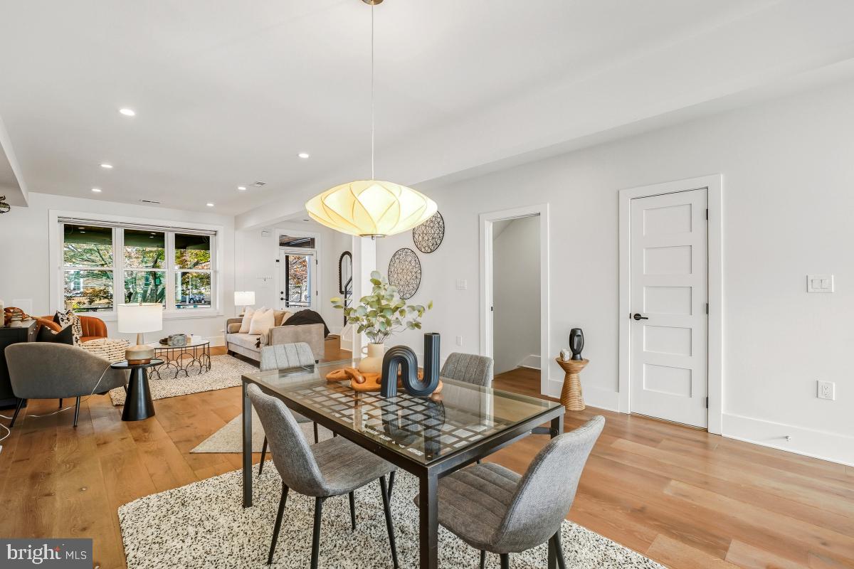 714 Decatur Street Northwest Washington, DC 20011 - Photo 12 of 40 a living room with furniture a window and a table