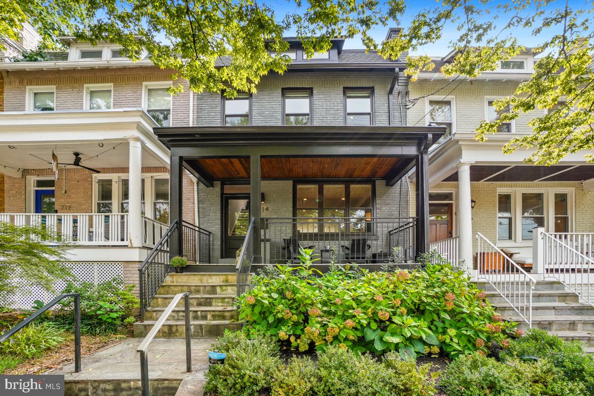714 Decatur Street Northwest Washington, DC 20011 - Photo 2 of 40 a front view of a house with garden