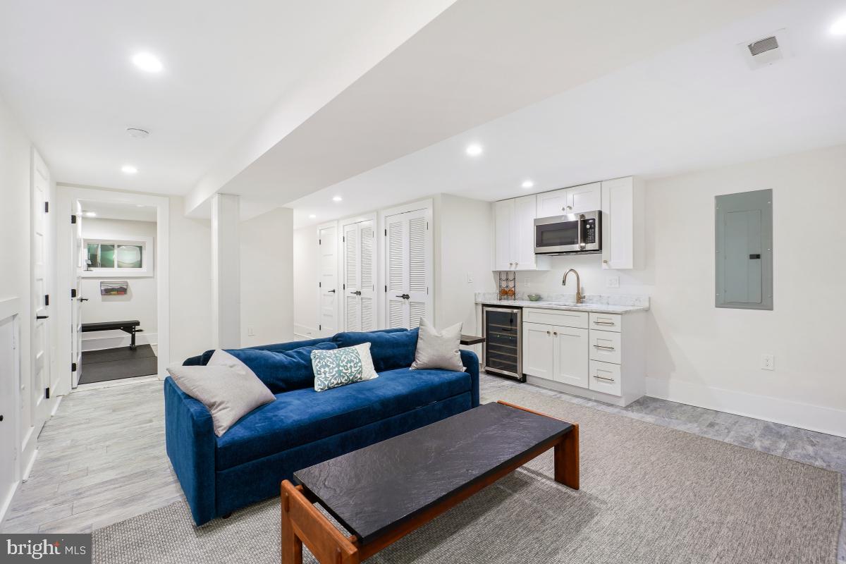 714 Decatur Street Northwest Washington, DC 20011 - Photo 26 of 40 a living room with furniture and view of kitchen