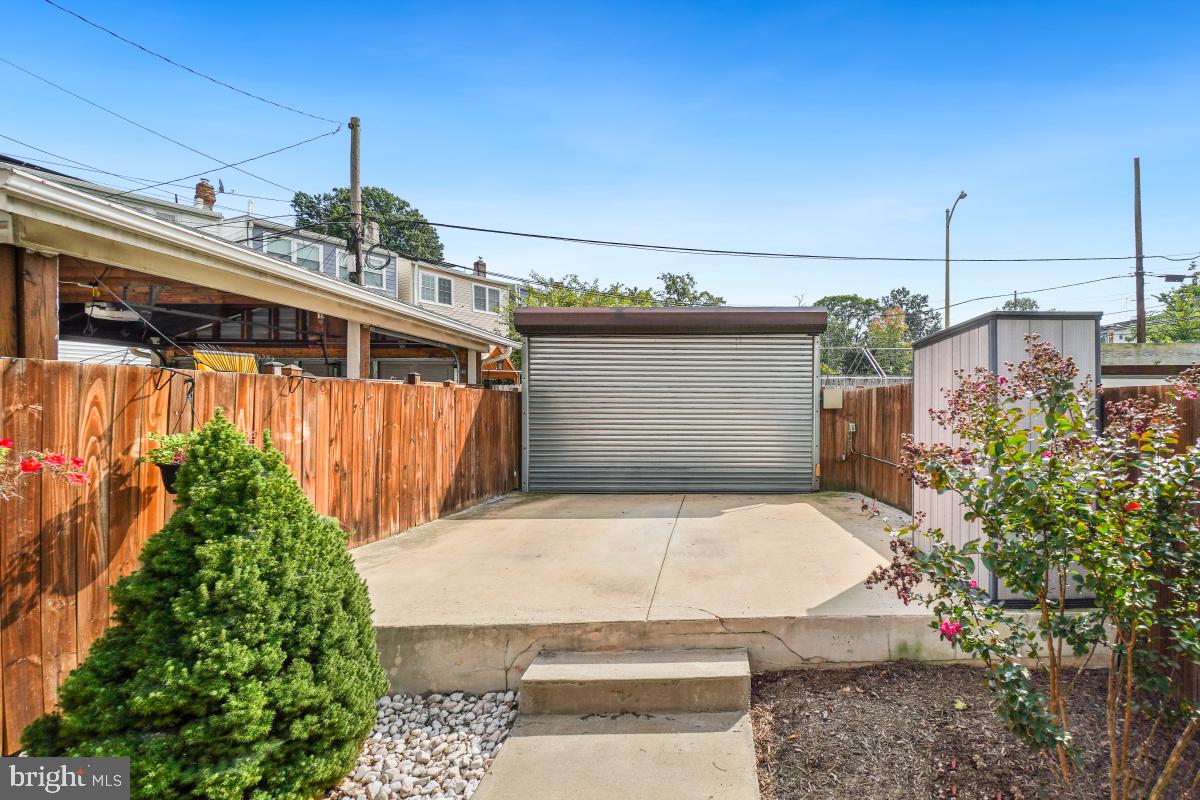 714 Decatur Street Northwest Washington, DC 20011 - Photo 37 of 40 a front view of a house with a yard