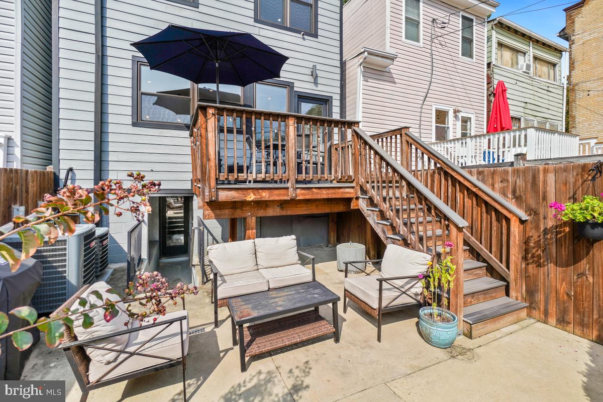 714 Decatur Street Northwest Washington, DC 20011 - Photo 38 of 40 a view of building with outdoor seating