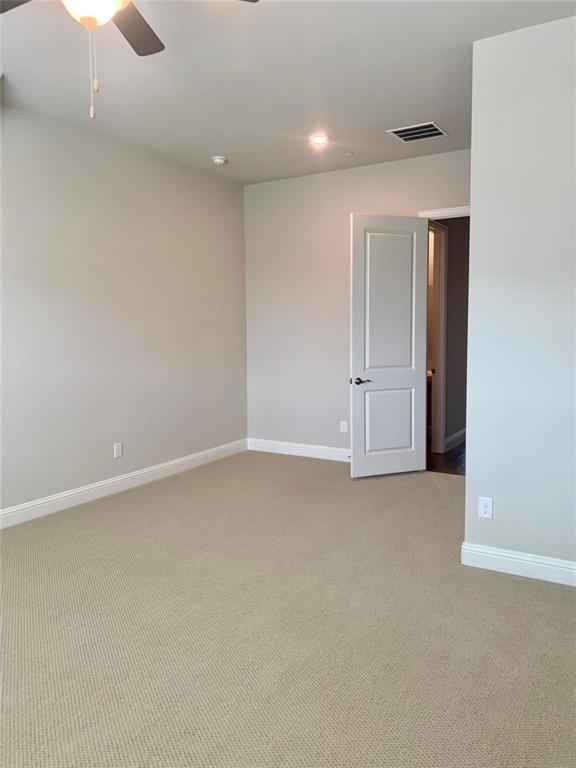 5537 Yellowstone Road The Colony, TX 75056 - Photo 12 of 25 Unfurnished room featuring light carpet, recessed lighting, and ceiling fan