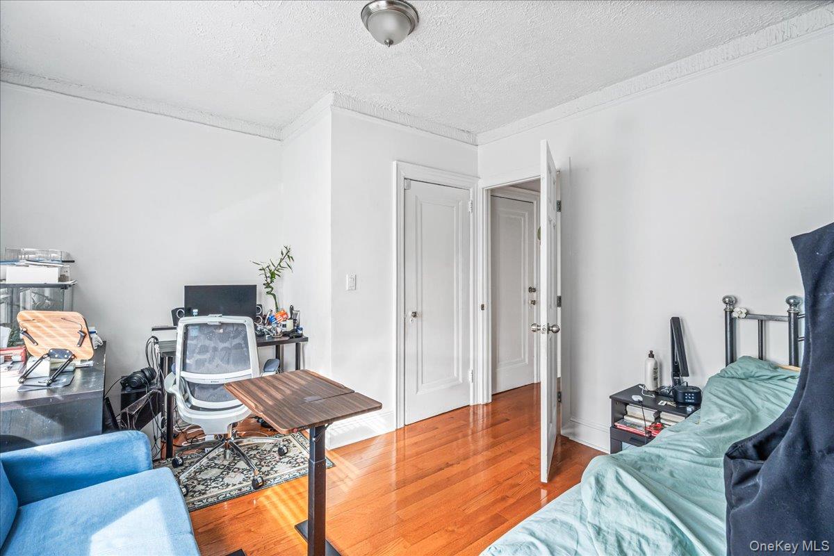 34-49 110th Street Queens, NY 11368 - Photo 17 of 21 a living room with furniture