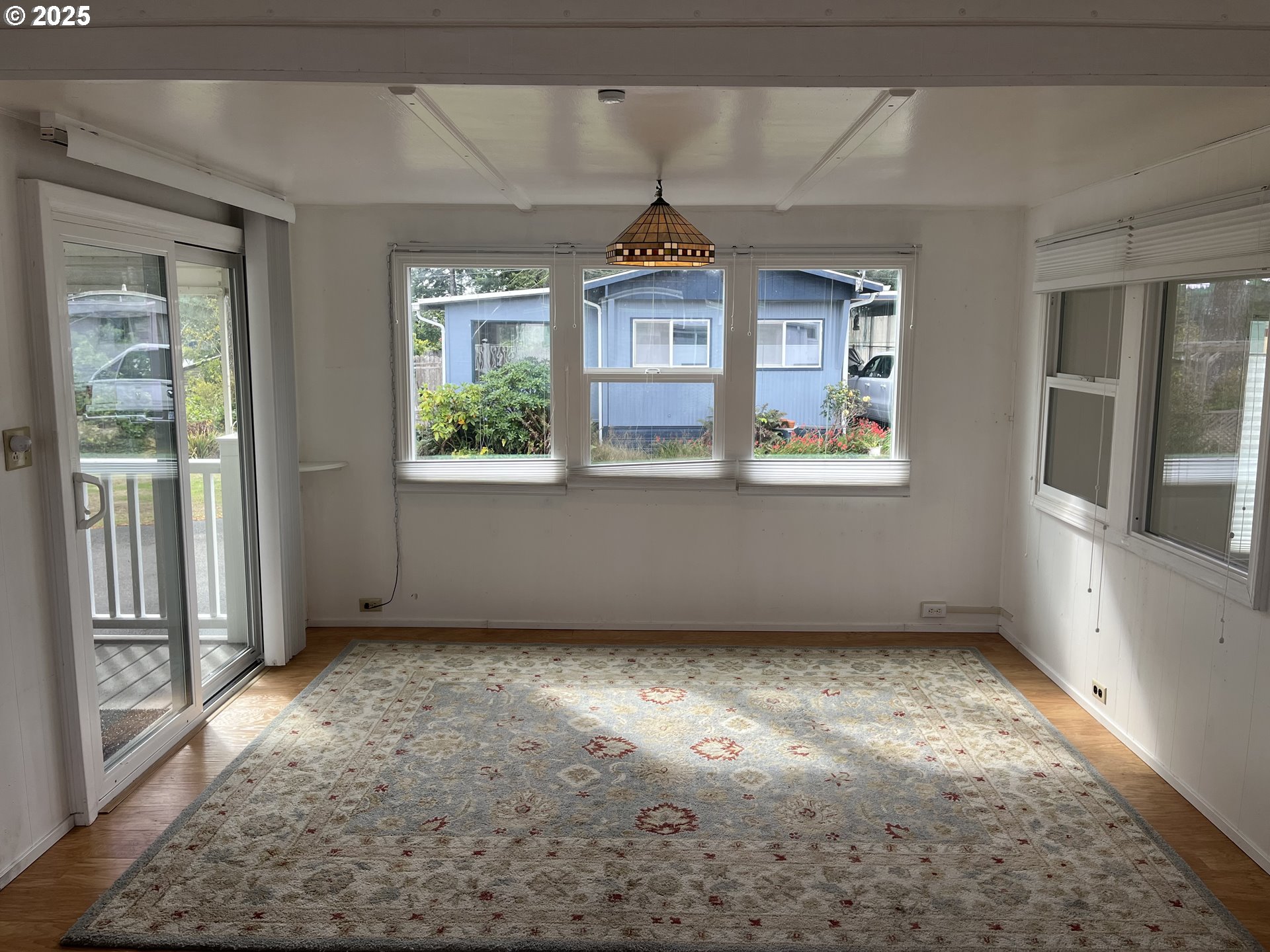 83763 Highway 101, Unit 14 Florence, OR 97439 - Photo 21 of 33 an empty room with windows
