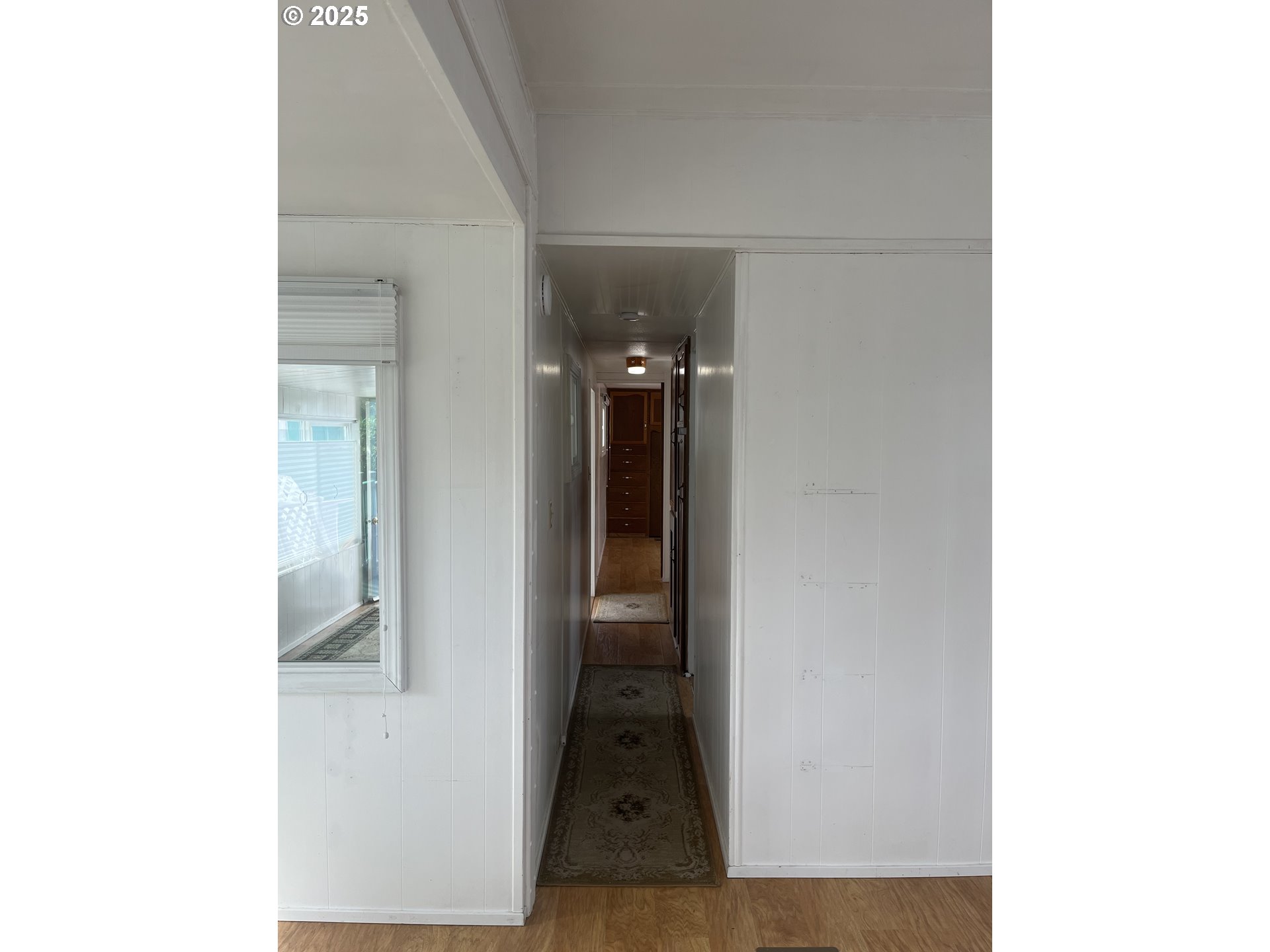 83763 Highway 101, Unit 14 Florence, OR 97439 - Photo 23 of 33 a view of hallway with stairs