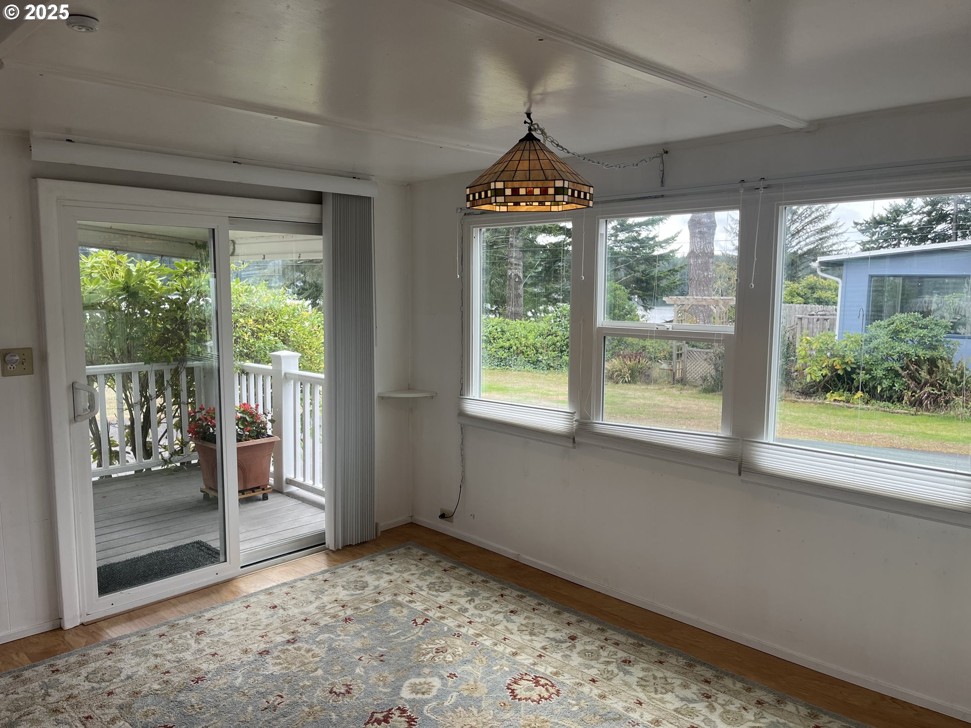 83763 Highway 101, Unit 14 Florence, OR 97439 - Photo 25 of 33 a view of a hallway with windows