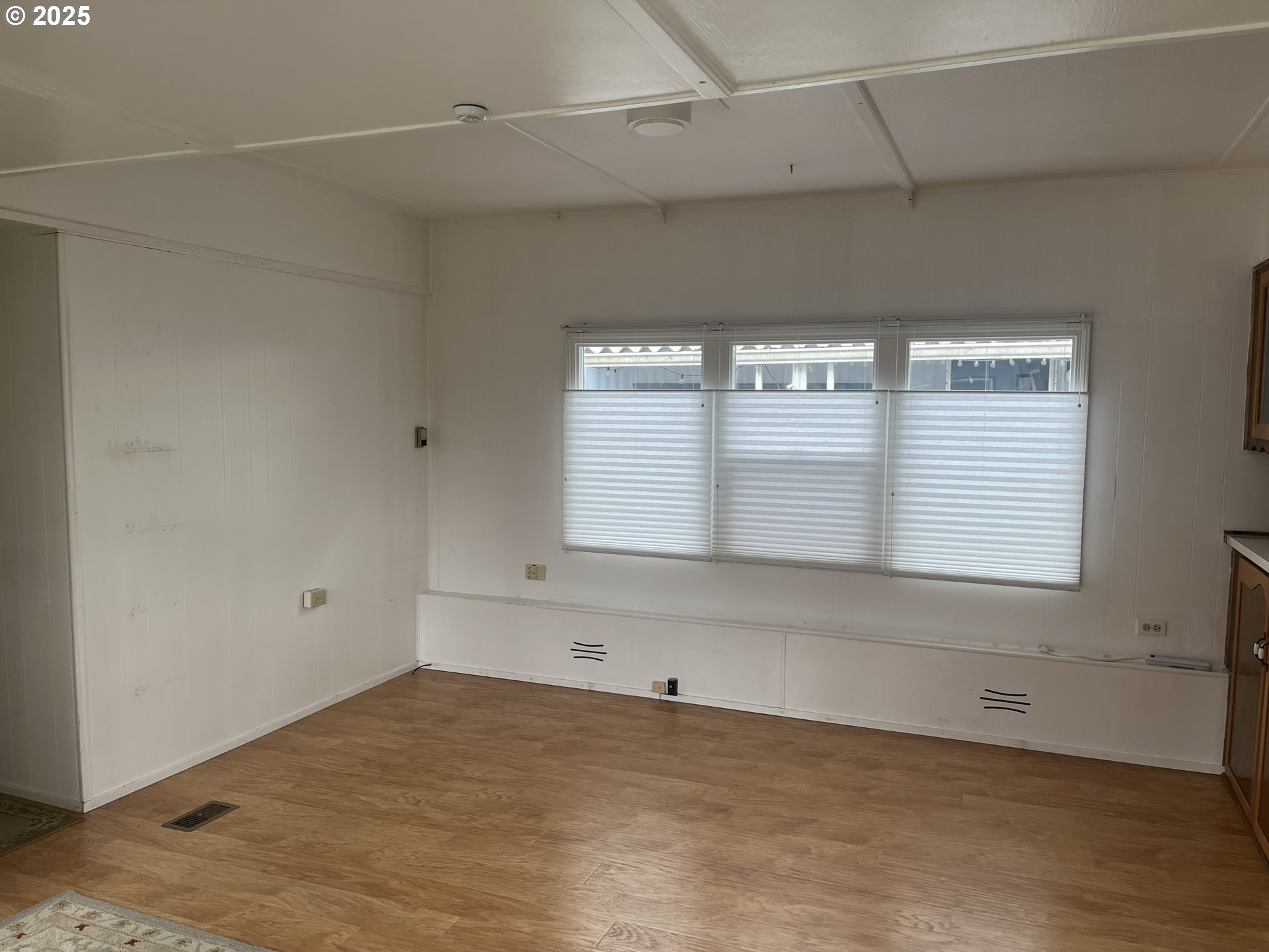 83763 Highway 101, Unit 14 Florence, OR 97439 - Photo 26 of 33 a view of an empty room with a window