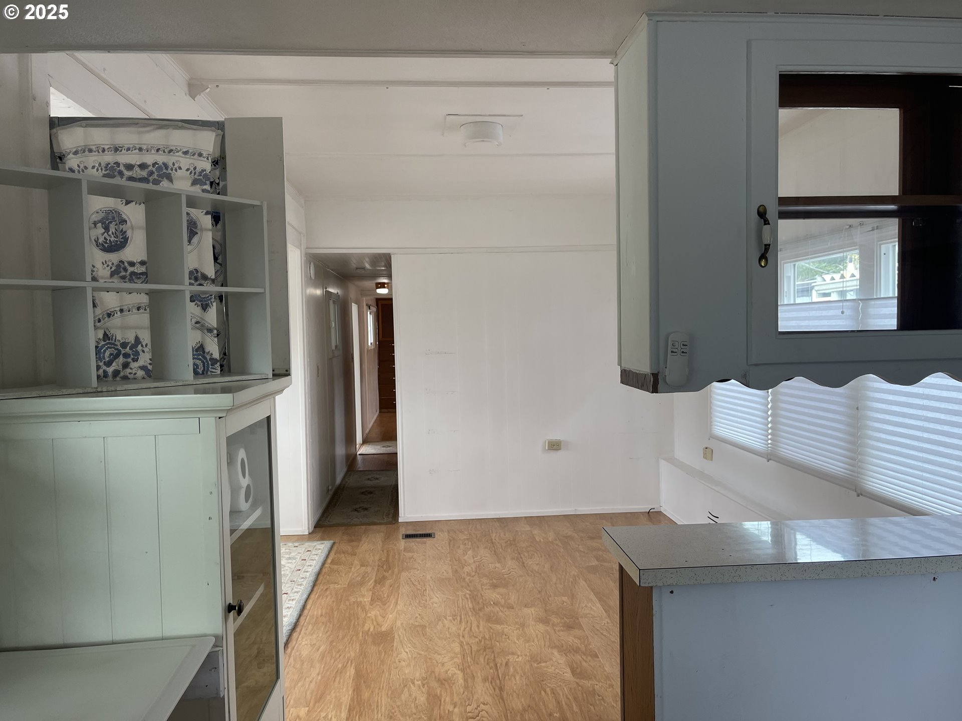 83763 Highway 101, Unit 14 Florence, OR 97439 - Photo 10 of 33 a bathroom with a sink a mirror and shower