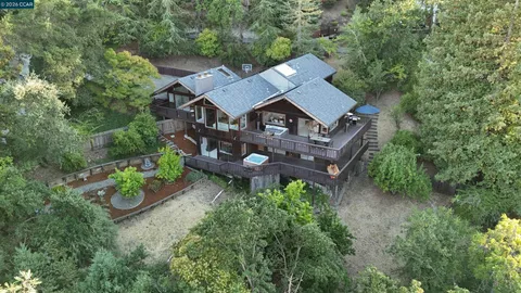 an aerial view of a house with garden