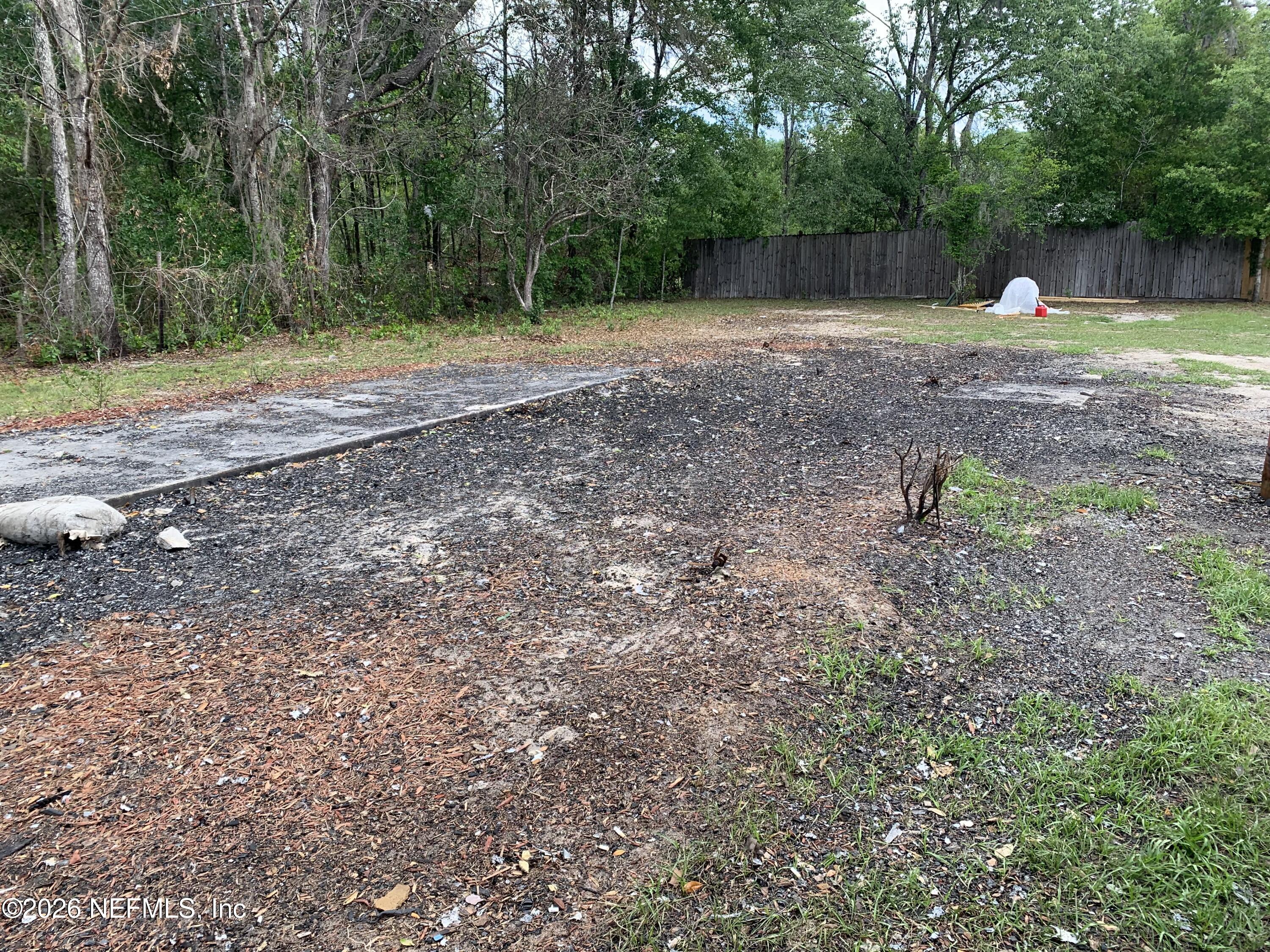 234 Maltas Avenue Interlachen, FL 32148 - Photo 3 of 9 a backyard of a house with lots of green space