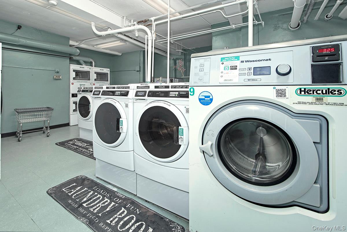 151 Centre Avenue, Unit 5D New Rochelle, NY 10805 - Photo 17 of 17 a utility room with dryer and washer