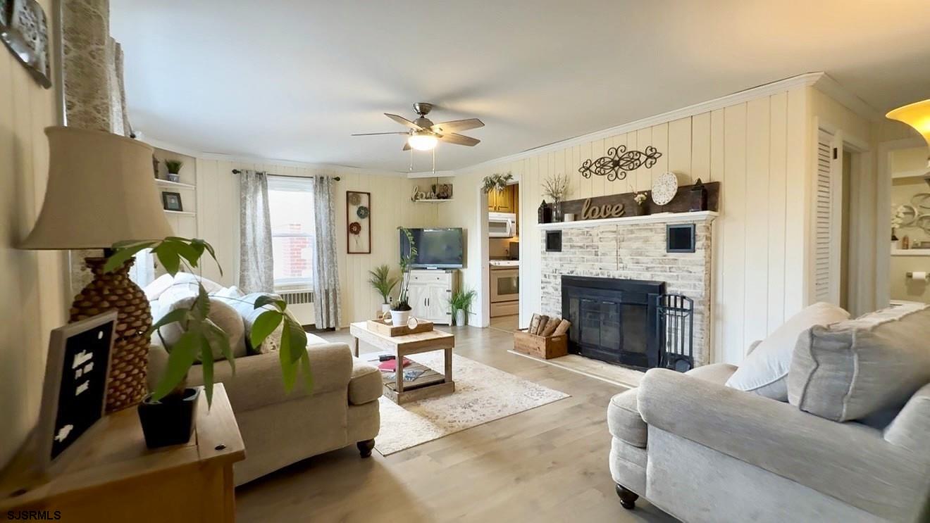 605 Shore Road Linwood, NJ 08221 - Photo 9 of 99 a living room with furniture and a fireplace