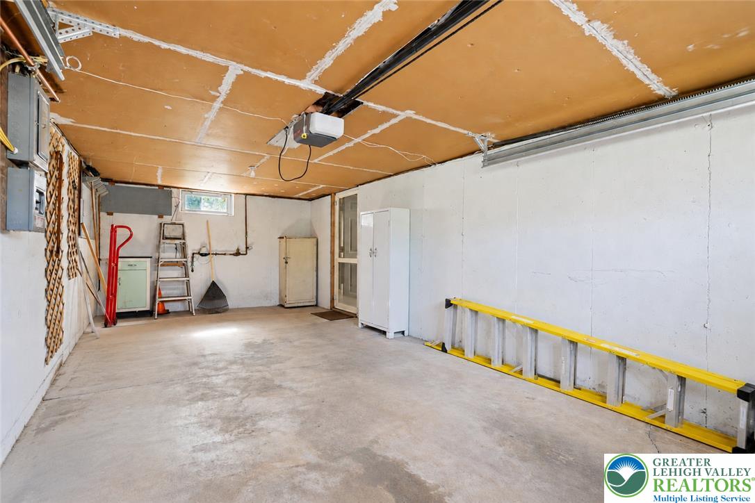 1539 Spring Garden Street Wilson, PA 18042 - Photo 28 of 34 A spacious garage interior provides functional utility concrete floors and solid masonry walls.