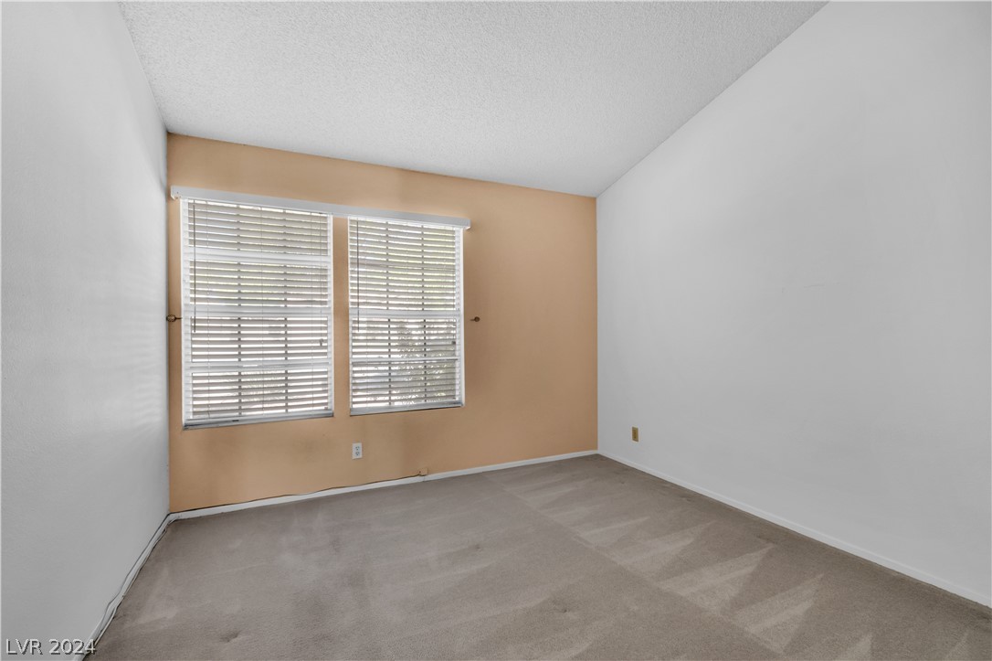 212 Pocahontas Court Henderson, NV 89074 - Photo 15 of 28 view of bedroom 3 from hallway