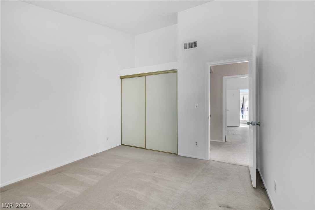 212 Pocahontas Court Henderson, NV 89074 - Photo 16 of 28 view of bedroom 3 from back corner looking out to