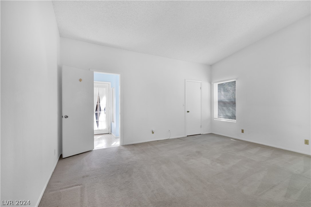 212 Pocahontas Court Henderson, NV 89074 - Photo 18 of 28 view of primary bedroom frothe entrance