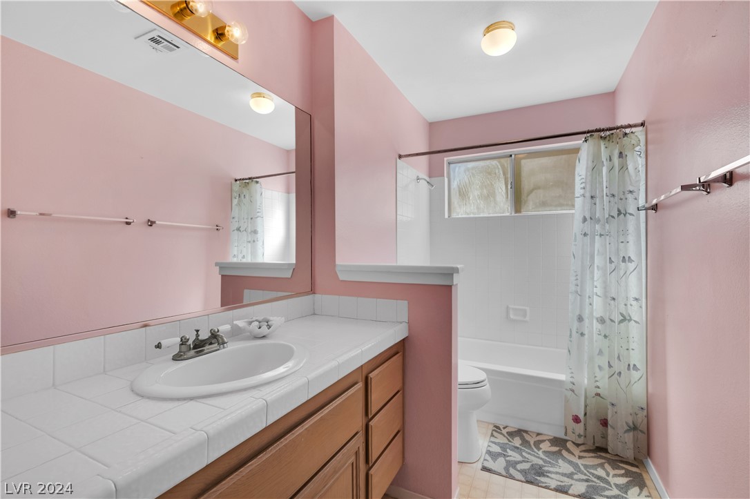 212 Pocahontas Court Henderson, NV 89074 - Photo 23 of 28 main bathroom looking in from hallway