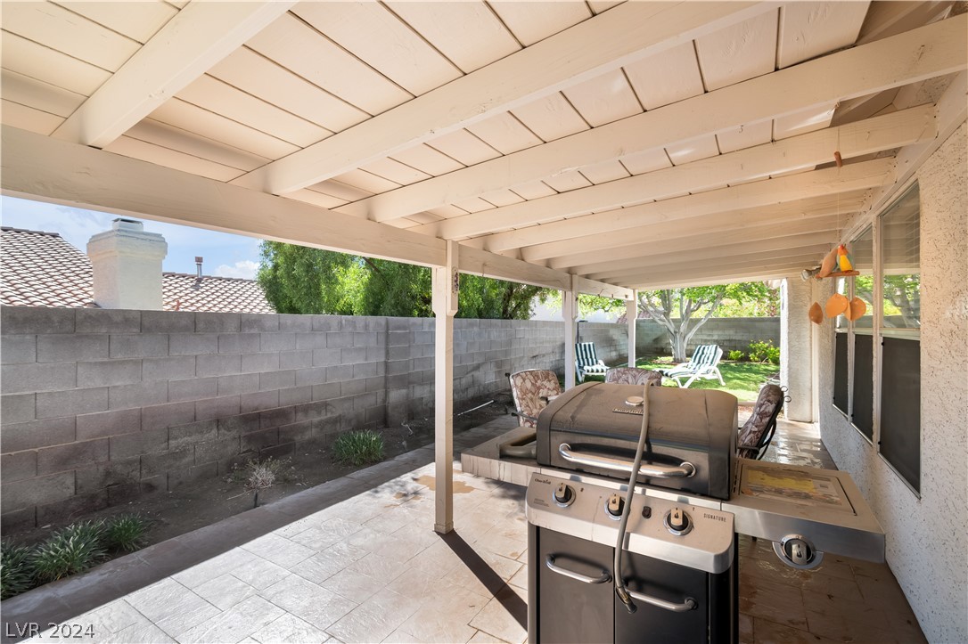 212 Pocahontas Court Henderson, NV 89074 - Photo 24 of 28 looking right once you step out of the slider in t