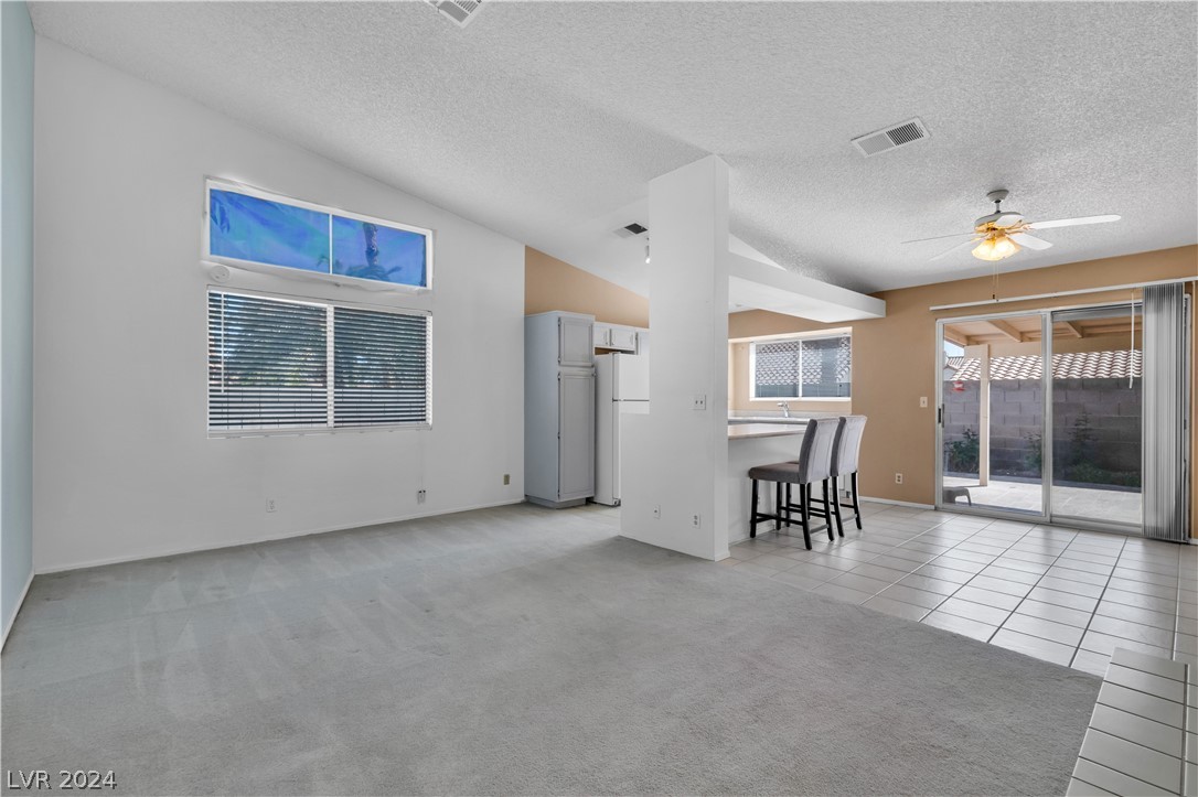 212 Pocahontas Court Henderson, NV 89074 - Photo 8 of 28 view of family room and kitchen
