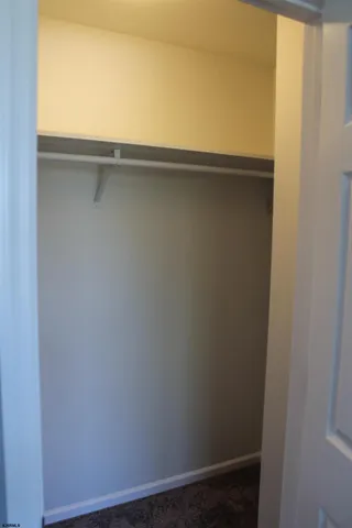 an empty room that has a window