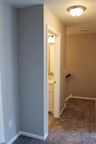 a view of a refrigerator and storage