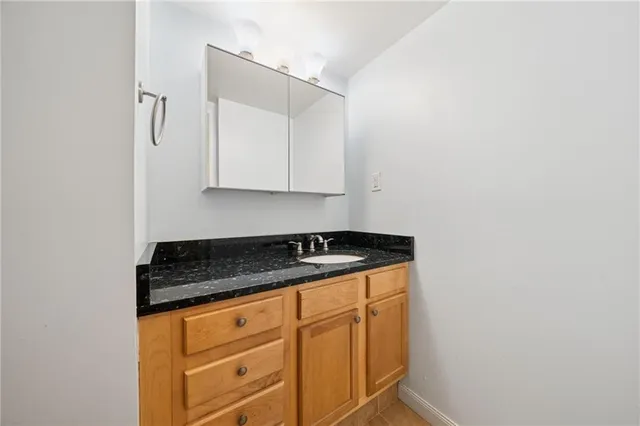 a view of cabinets and wooden floor