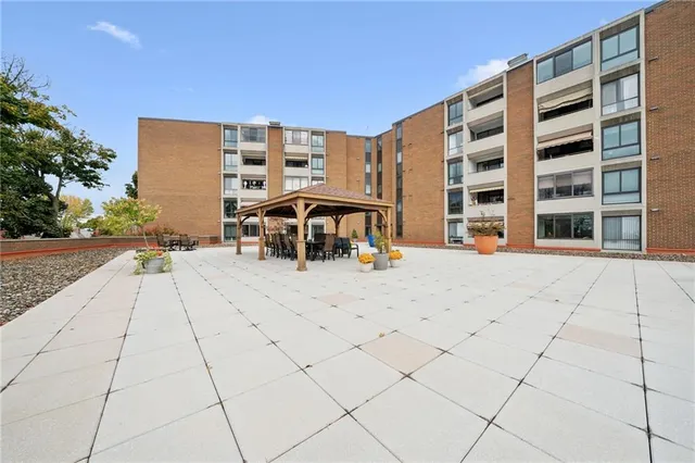 an aerial view of a house with outdoor space