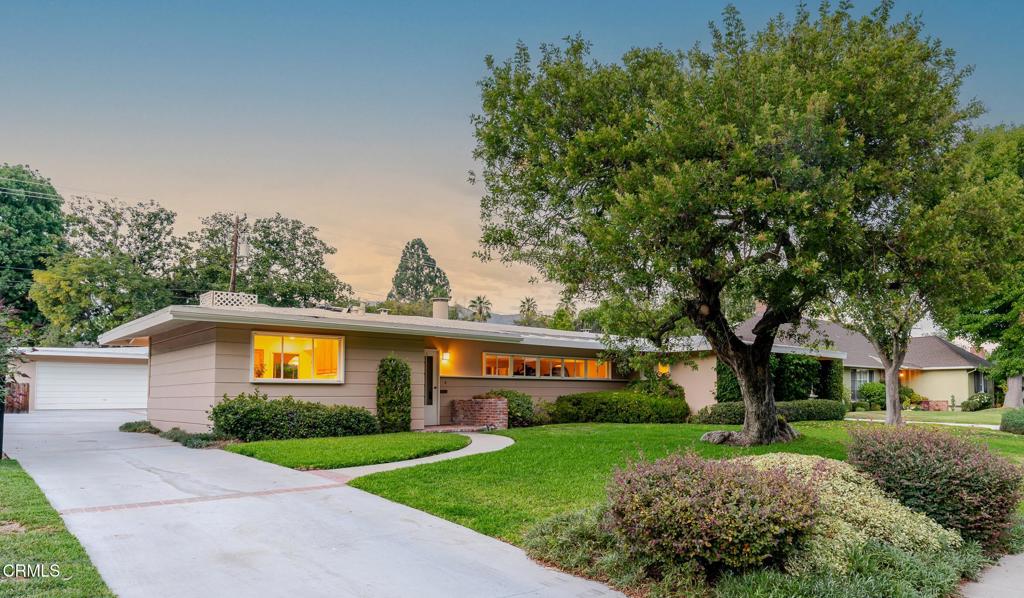 front view of a house with a yard