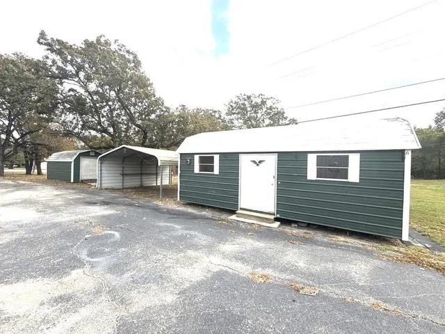 a view of an outdoor space and a yard