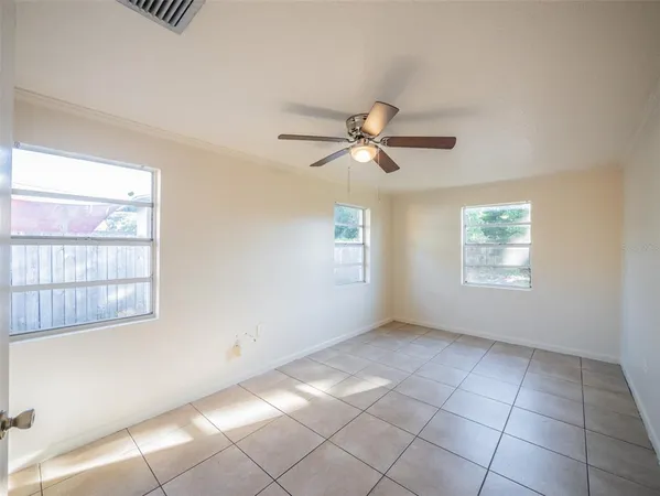 an empty room with windows