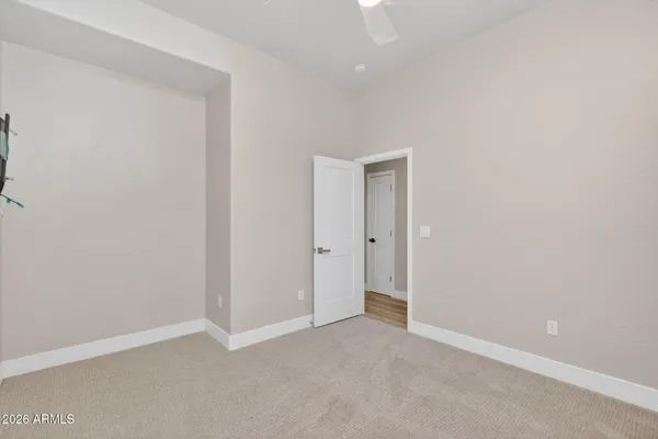 a view of an empty walk in closet