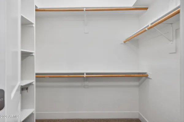 a view of an empty walk in closet