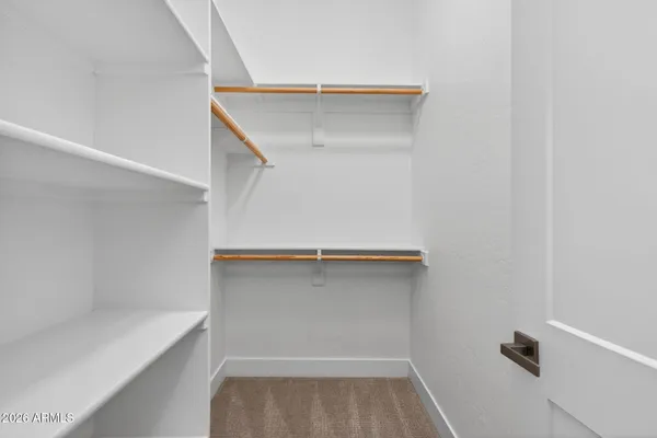 a kitchen with stainless steel appliances a sink stove and cabinets