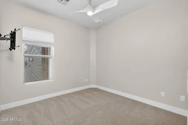 a bathroom with a shower and a toilet