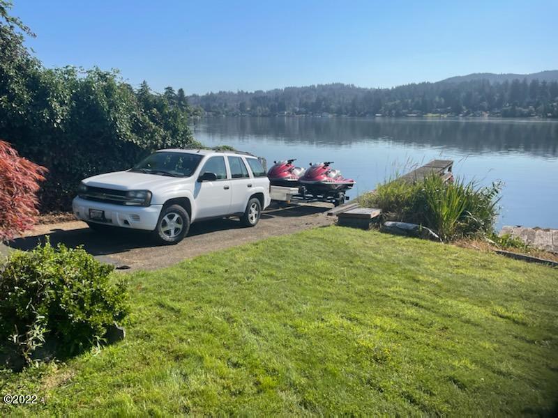 3131 Northeast Johns Loop Neotsu, OR 97364 - Photo 3 of 38 Private Boat ramp at end of driveway