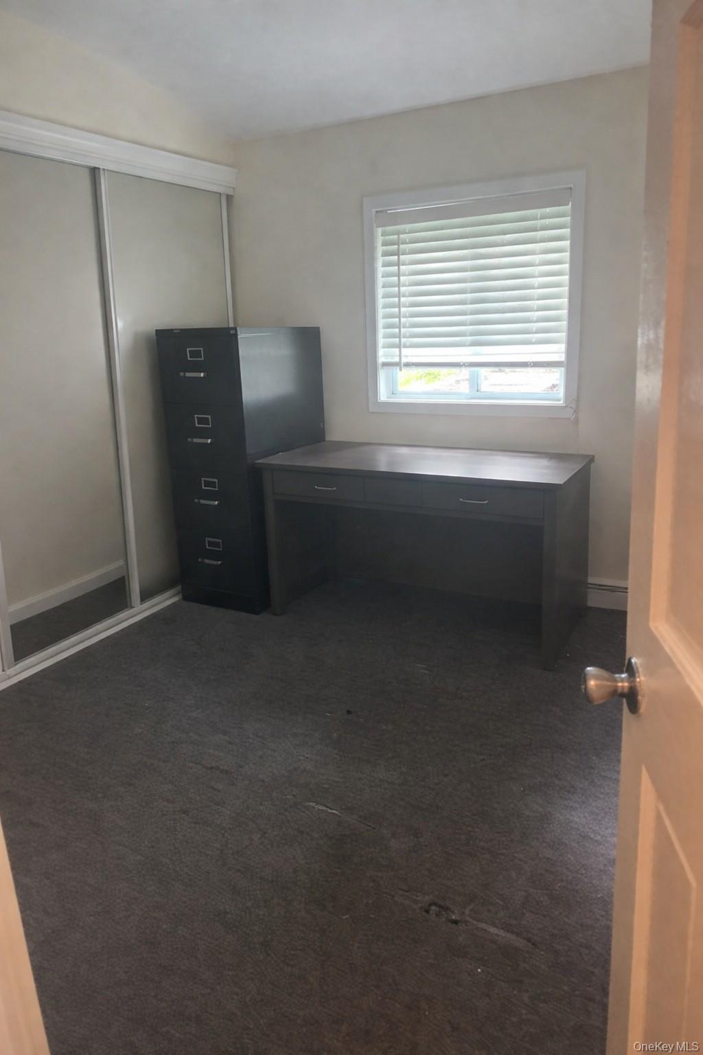 4 Halliday Road Coram, NY 11727 - Photo 12 of 19 a room with window and closet