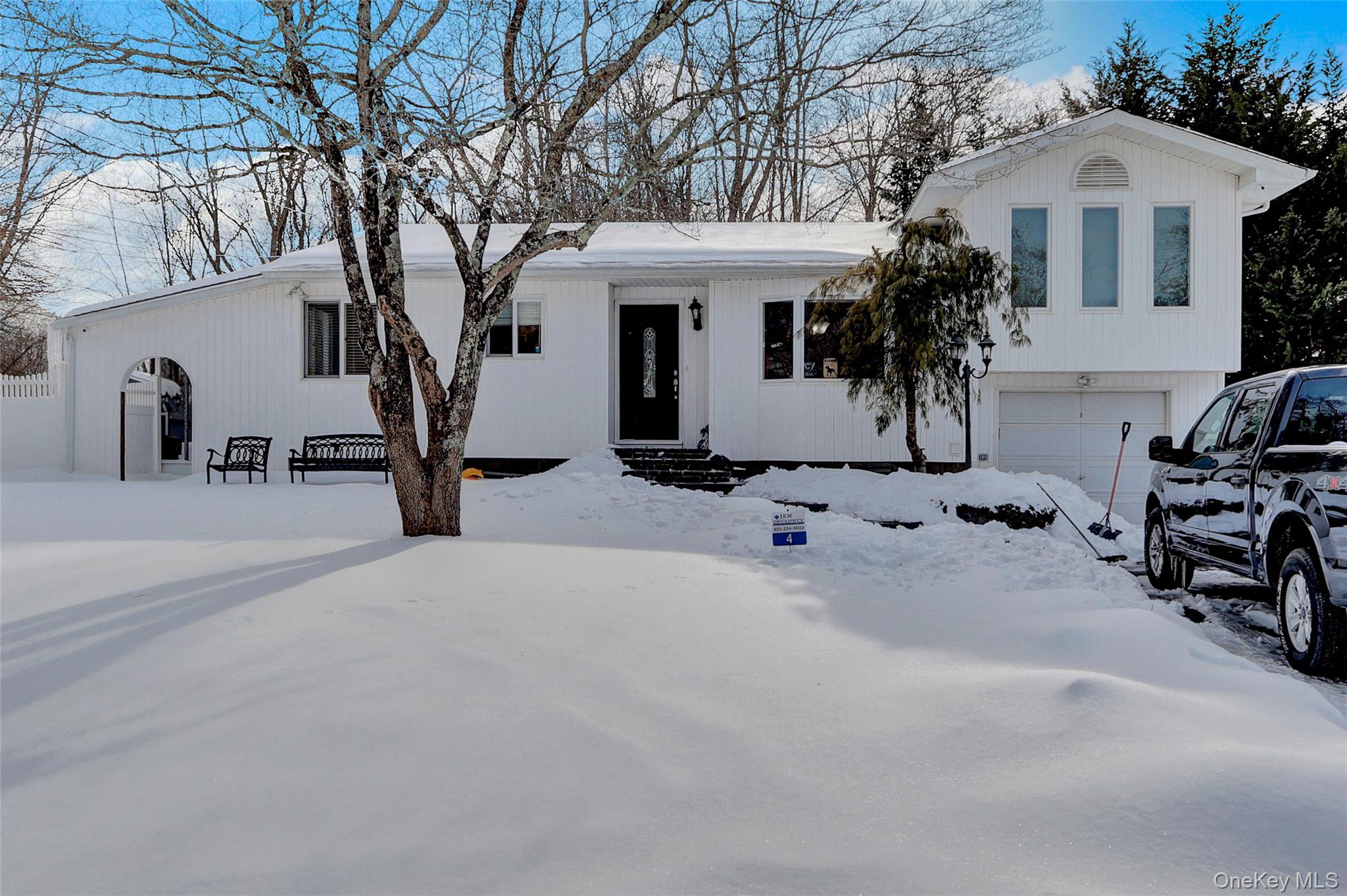 4 Halliday Road Coram, NY 11727 - Photo 2 of 28 a view of a house with backyard and sitting area