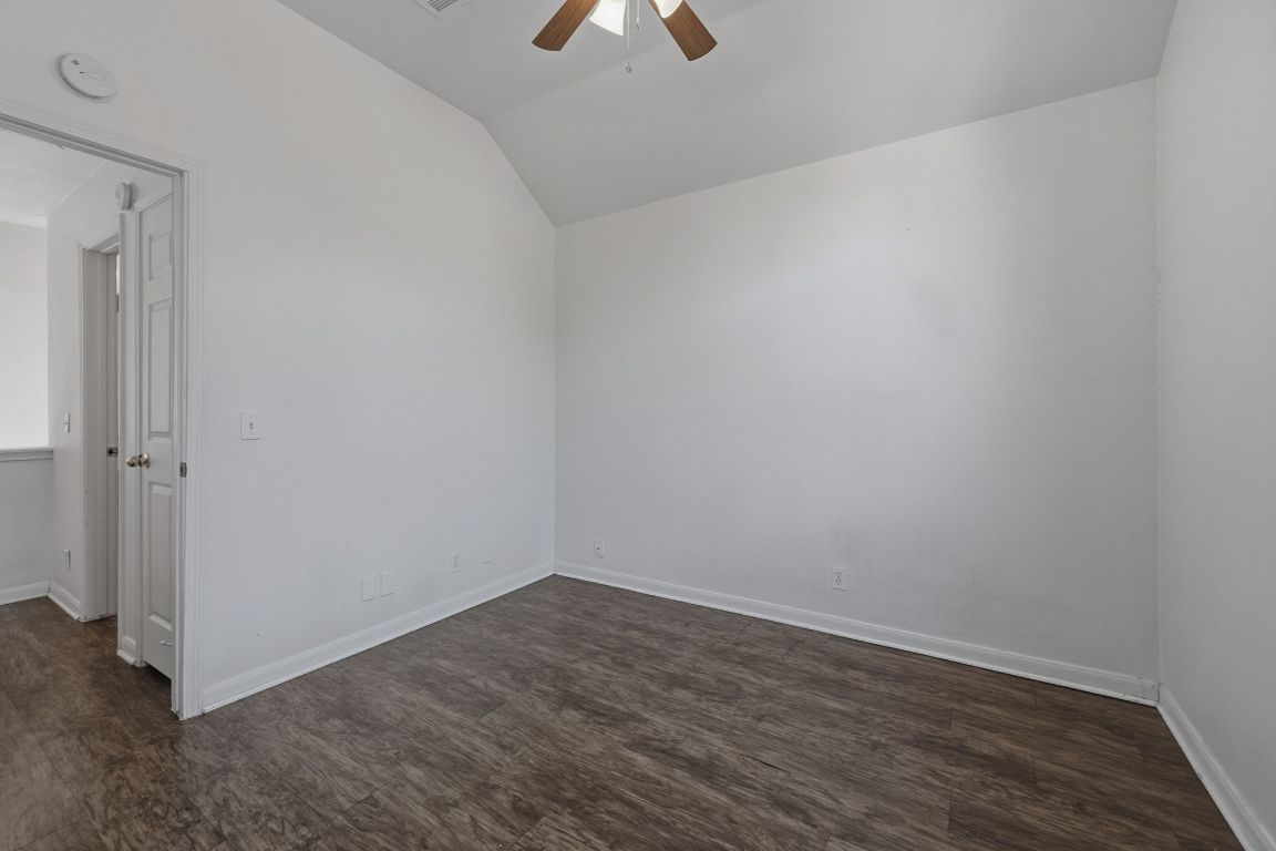 5237 Coppermead Lane Austin, TX 78754 - Photo 18 of 25 a view of an empty room and wooden floor