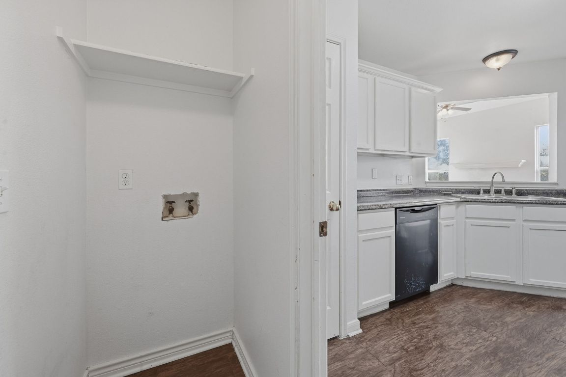 5237 Coppermead Lane Austin, TX 78754 - Photo 21 of 25 a kitchen with a sink cabinets and appliances