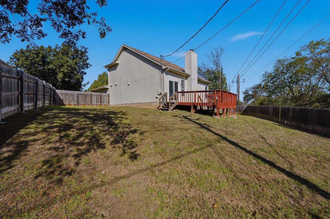 5237 Coppermead Lane Austin, TX 78754 - Photo 23 of 25 a view of a house with a yard