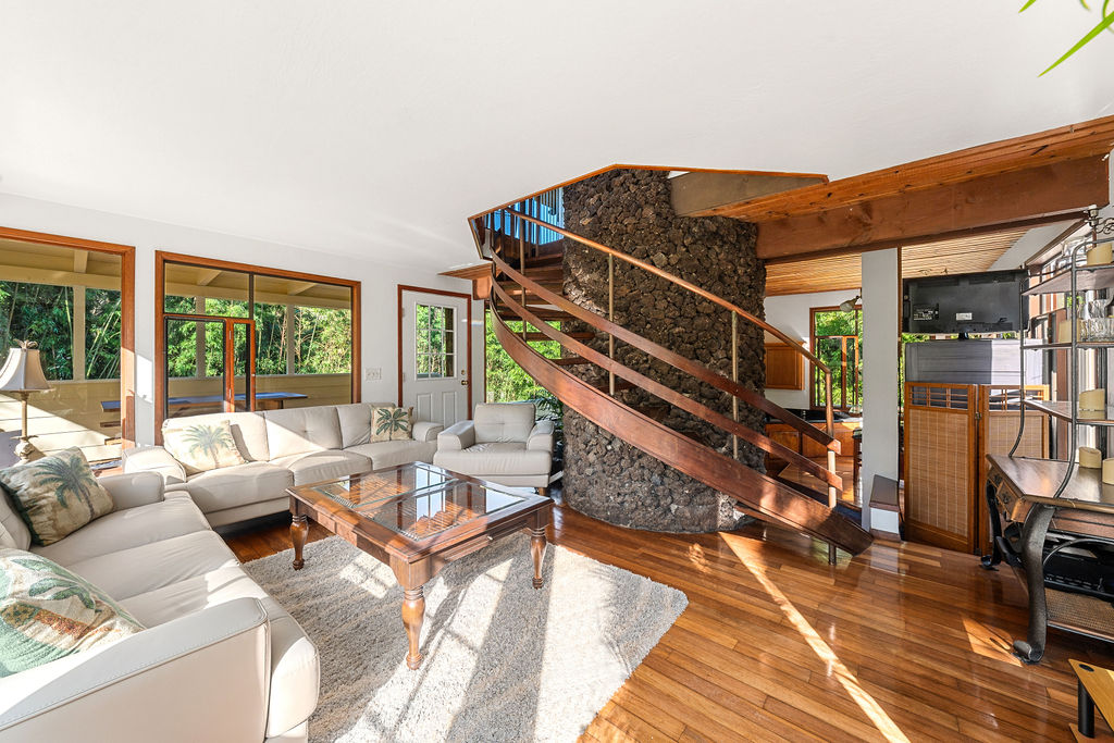 1444 East Kuiaha Road Haiku, HI 96708 - Photo 19 of 29 a living room with furniture a wooden floor and next to a window