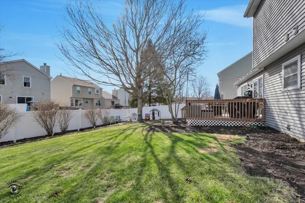 a view of a house with a yard porch and sitting area
