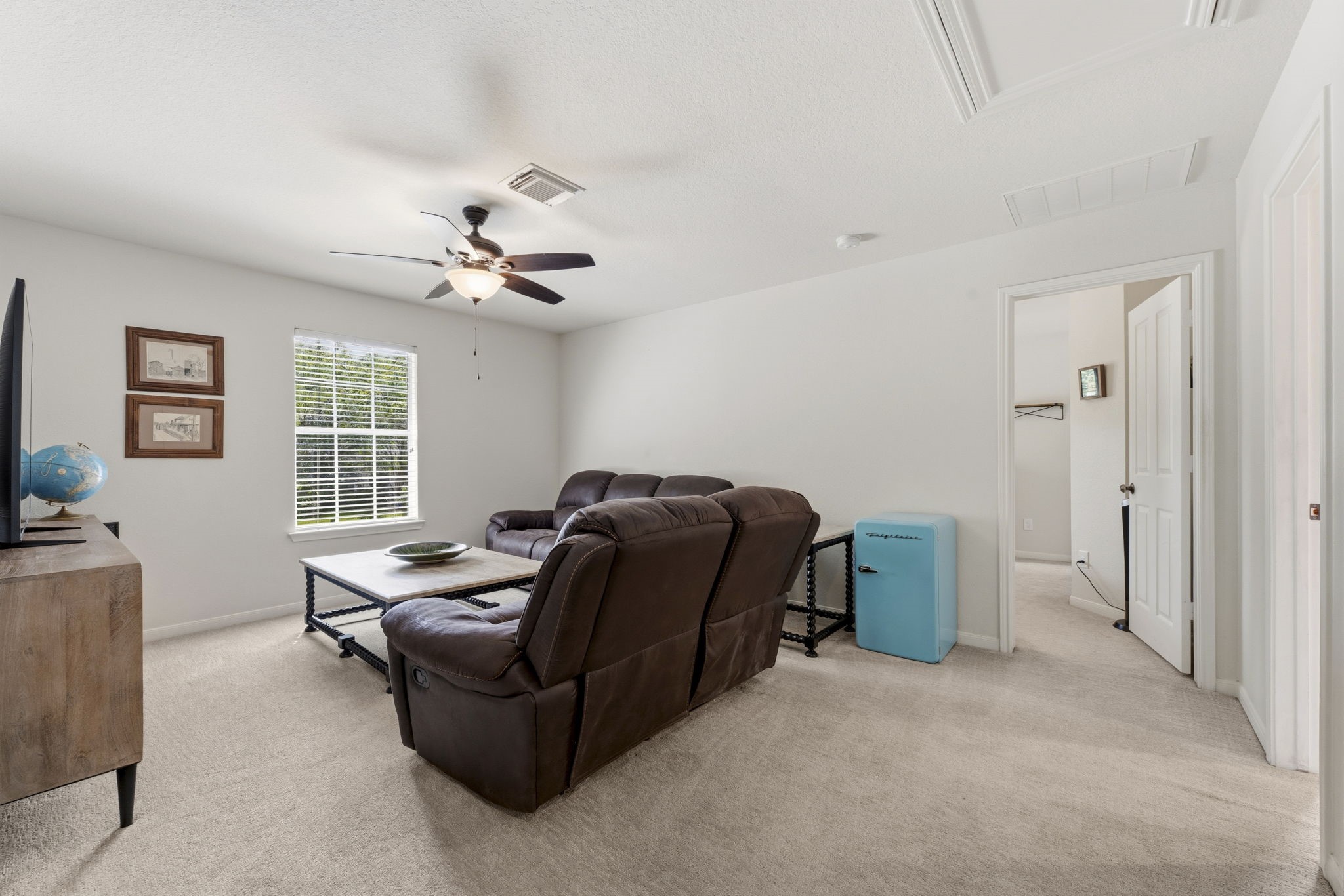 6 North Flickering Sun Circle Spring, TX 77382 - Photo 20 of 33 Open gameroom/den leads to all three bedrooms!