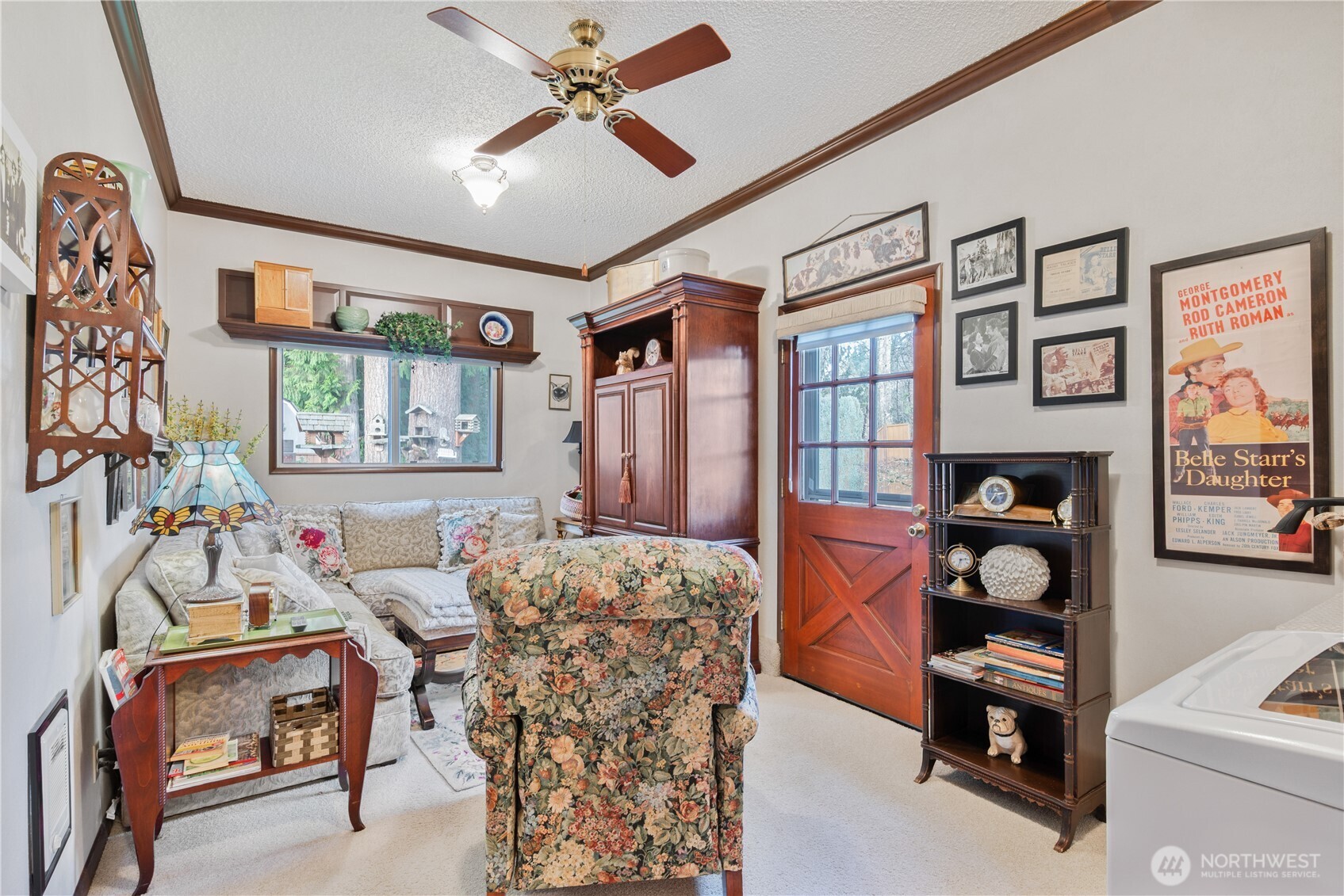 1008 16th Place Kelso, WA 98626 - Photo 14 of 40 a living room with furniture a flat screen tv and a window