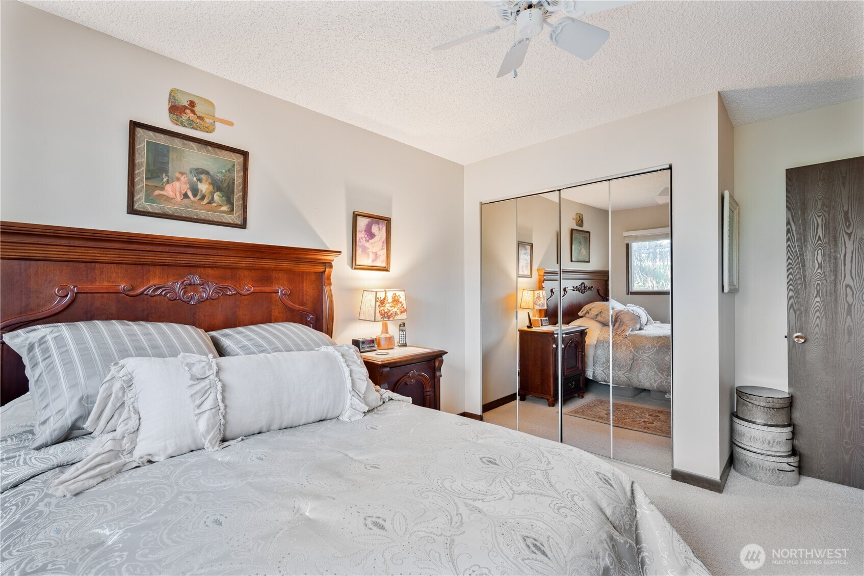 1008 16th Place Kelso, WA 98626 - Photo 22 of 40 a bedroom with a large bed and a view of bedroom