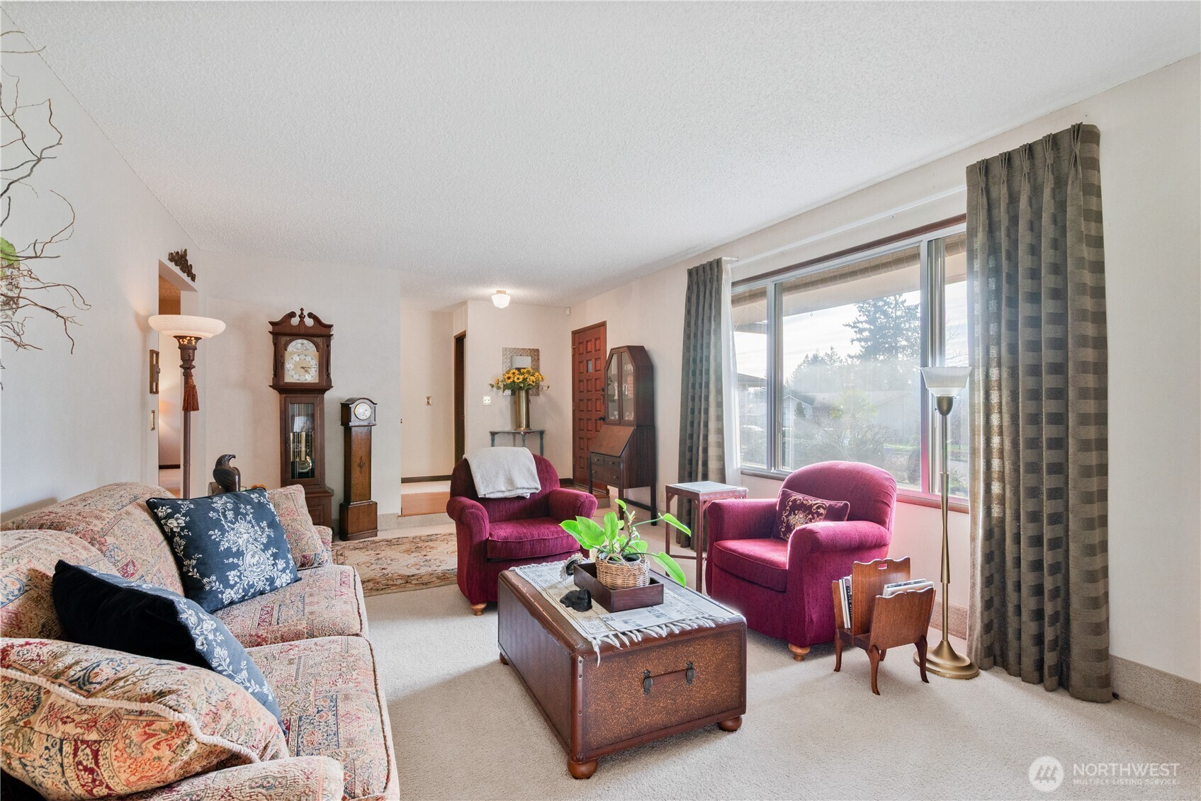 1008 16th Place Kelso, WA 98626 - Photo 7 of 40 a living room with furniture and a large window