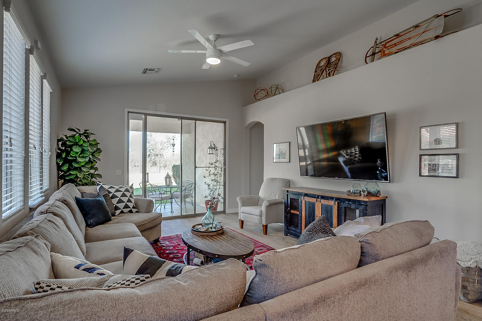 2520 East Fremont Road Phoenix, AZ 85042 - Photo 25 of 62 a living room with furniture and a flat screen tv