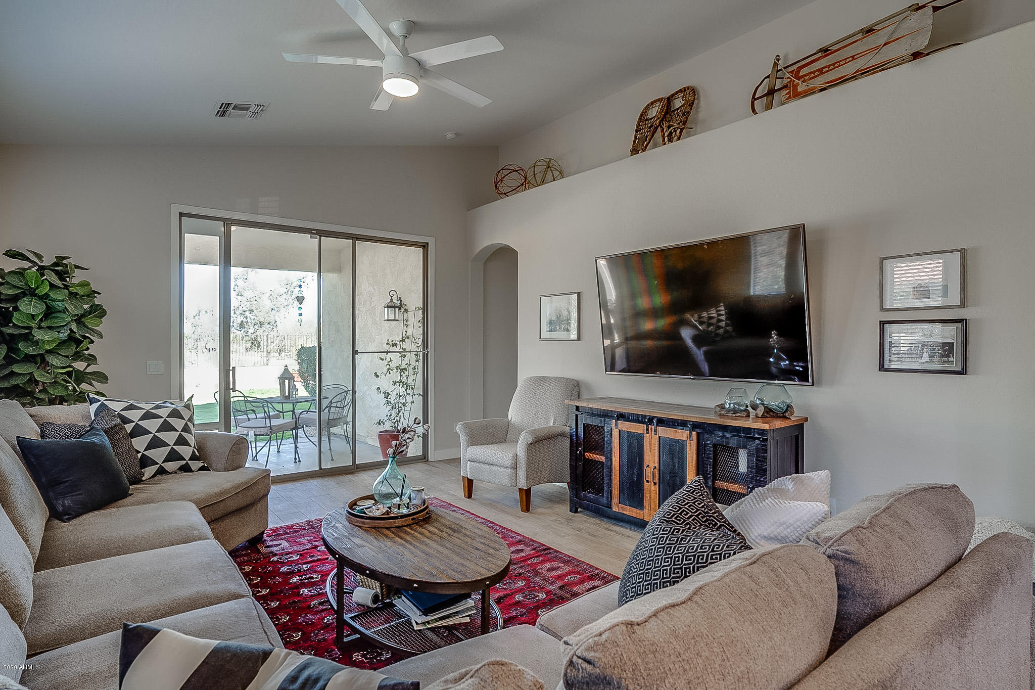 2520 East Fremont Road Phoenix, AZ 85042 - Photo 26 of 62 a living room with furniture and a flat screen tv