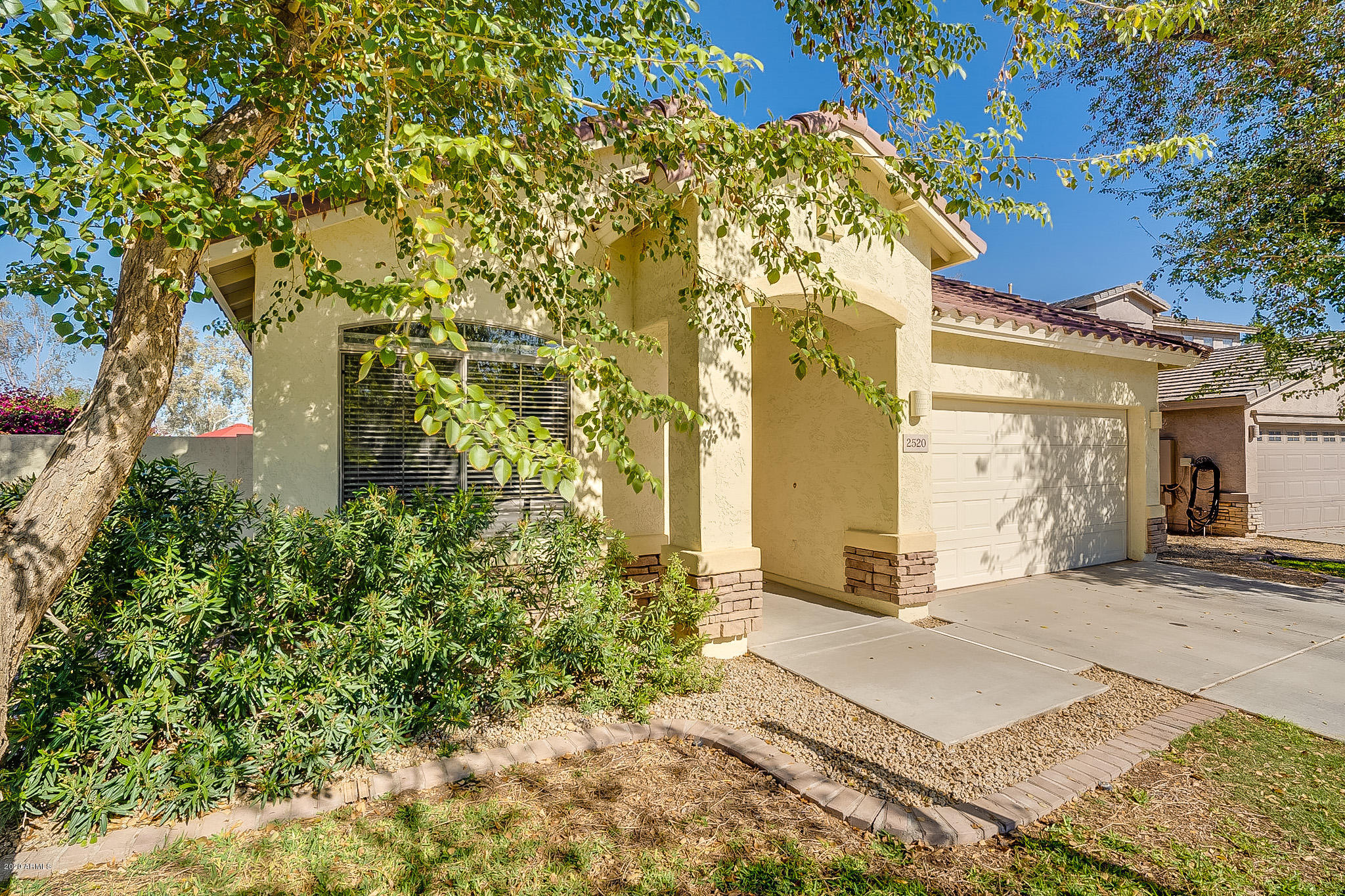 2520 East Fremont Road Phoenix, AZ 85042 - Photo 3 of 62 a front view of a house with a yard